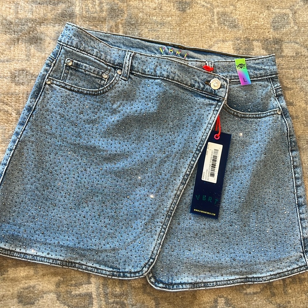 NWT! Adorable rhinestone stretch Jean skirt. Size L extra stretchy!!!!